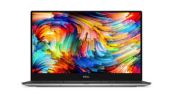 Refurbished A modern Dell XPS 13 laptop with a vibrant abstract color background on its screen, showcasing a wide variety of colors in a