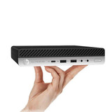 Person holding HP EliteDesk 800 G5 Micro i5 9th Generation laptop at an angle that highlights its design and ports.