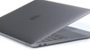 Refurbished Image of a MacBook Pro laptop, front view with display closed, showing minimal wear on keyboard and palm rest, indicating